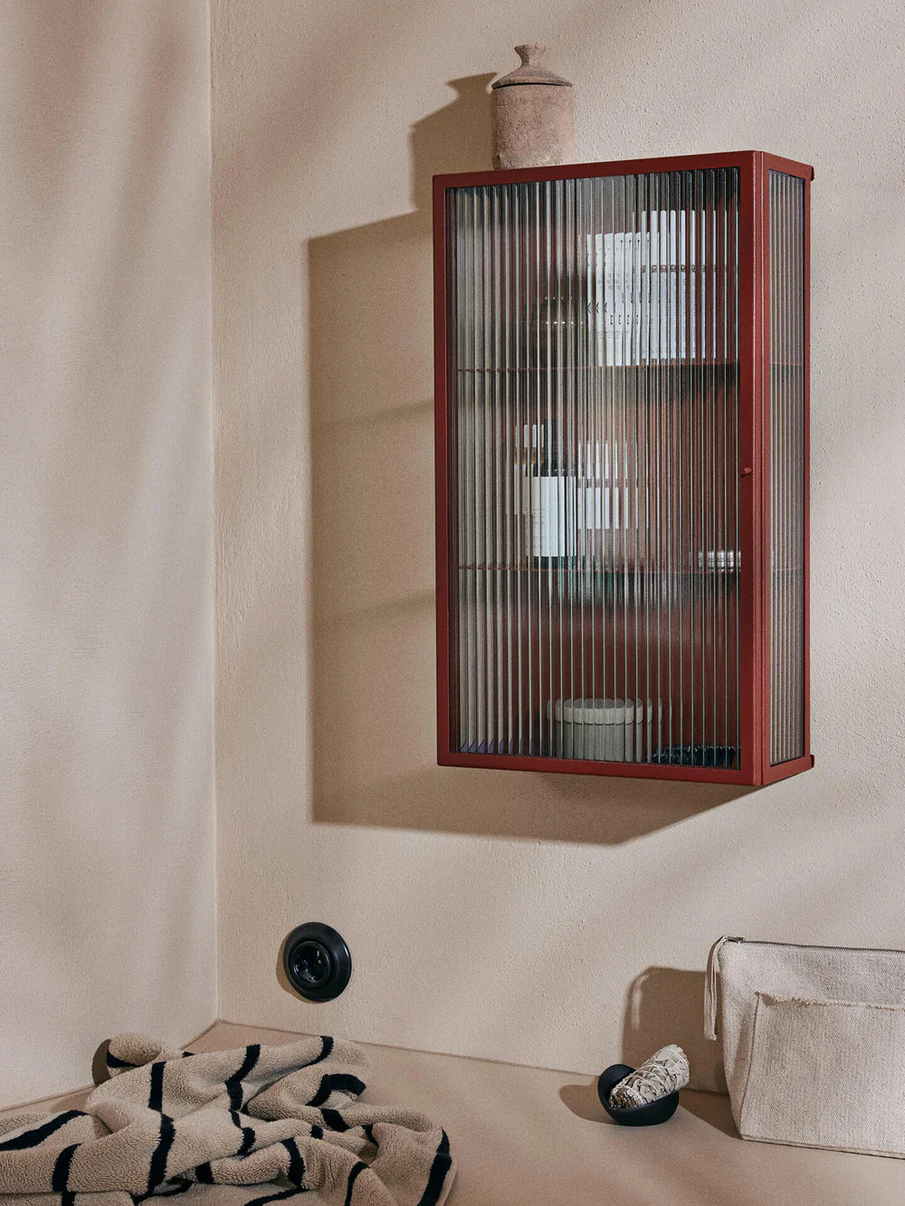 FERM LIVING | HAZE WALL CABINET - REEDED GLASS - OXIDE RED | $489.00
