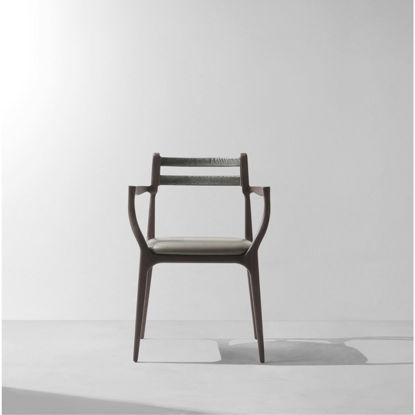 ASSEMBY DINING CHAIR WITH ARMS | $2,538.00