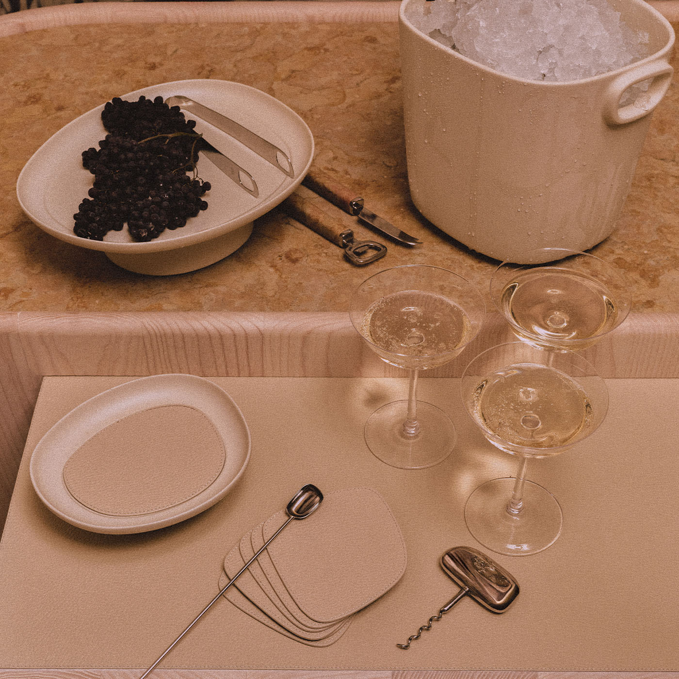 GIOBAGNARA | SET OF 6 MARIS BEIGE LEATHER COASTERS BY KELLY WEARSTLER | $240.00