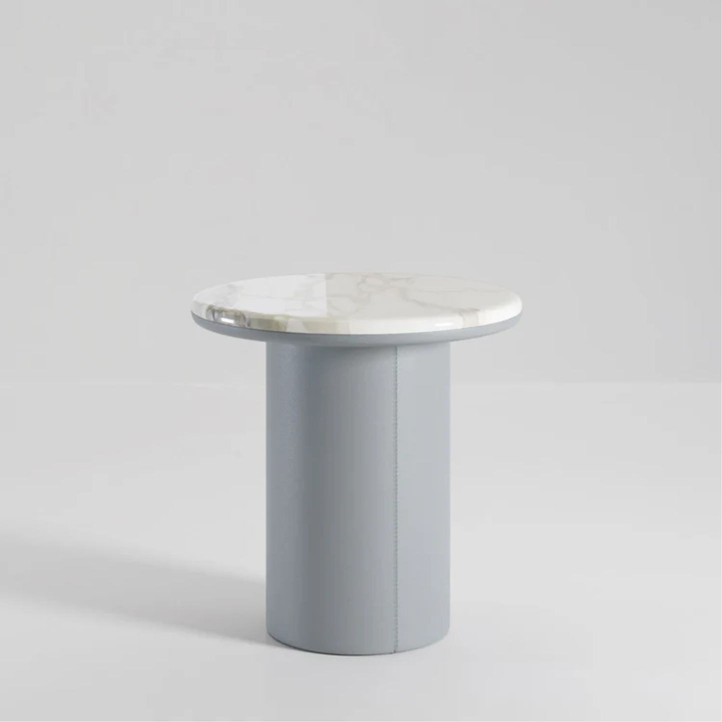 SECOLO | GEMINI LEATHER AND CALACATTA MARBLE SIDE TABLE | $6,785