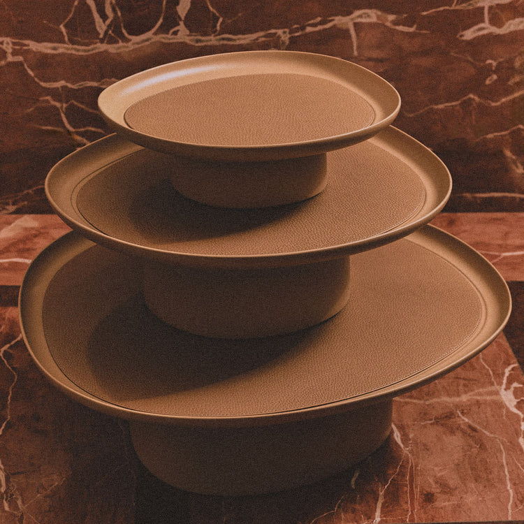GIOBAGNARA | MARIS LARGE ROUND BEIGE RAISED TRAY BY KELLY WEARSTLER | $1,500.00