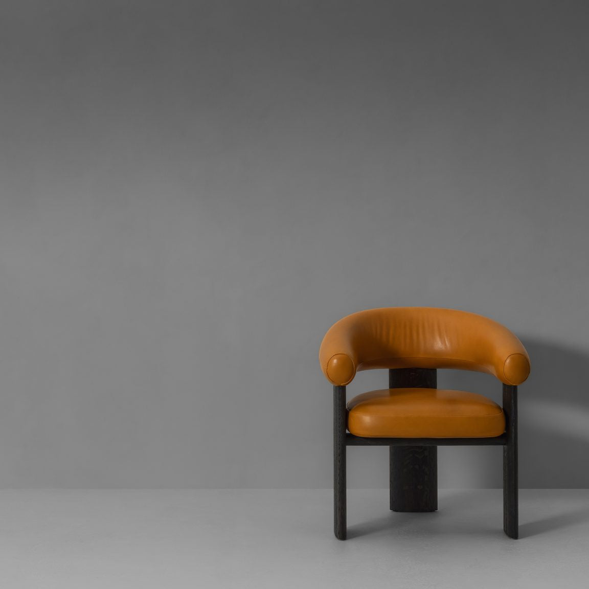 VAN ROSSUM | BRACCI DINING ARMCHAIR | $8,696.00